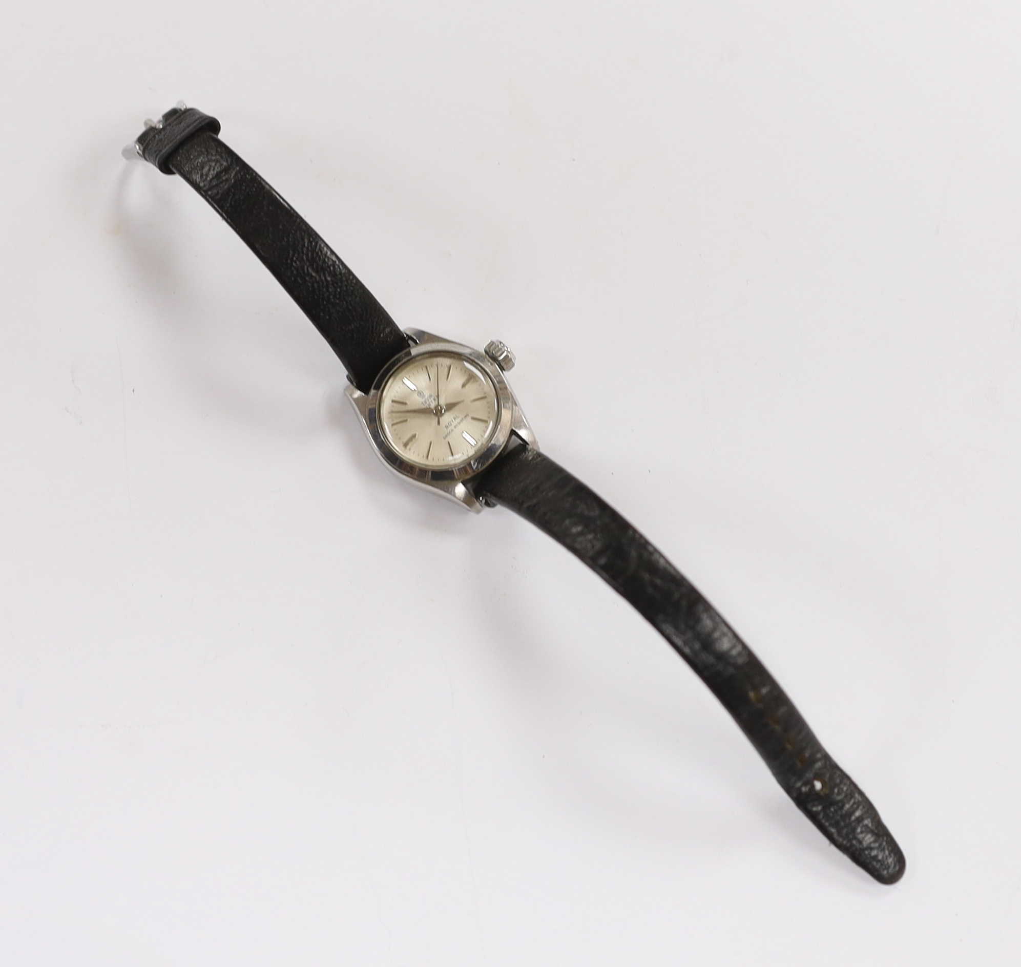 A lady's stainless steel Tudor Oyster Royal manual wind wrist watch, on an associated black leather strap, with Tudor box and receipt.